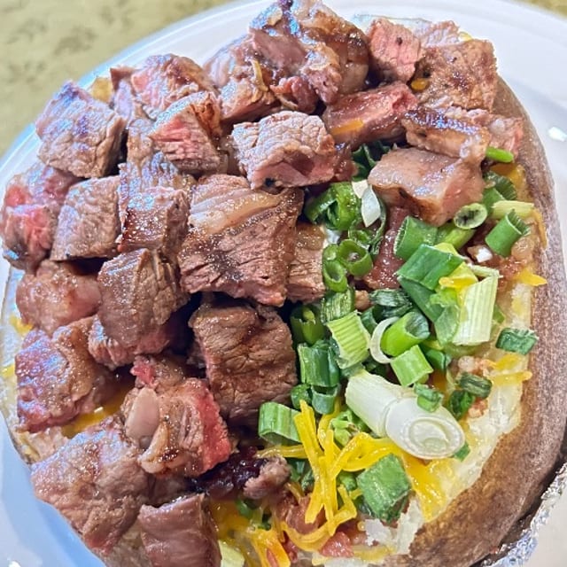 Rib Eye Baked Potato.